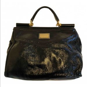 Dolce and Gabbana black patent leather purse. Comes with dust bag and strap